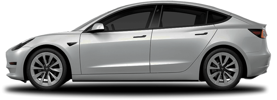 Silver Tesla Model 3 seen from the left side, showcasing its smooth, modern silhouette, aerodynamic body, and tinted windows.